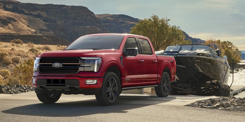 red exterior of 2025 ford f-150 side view 